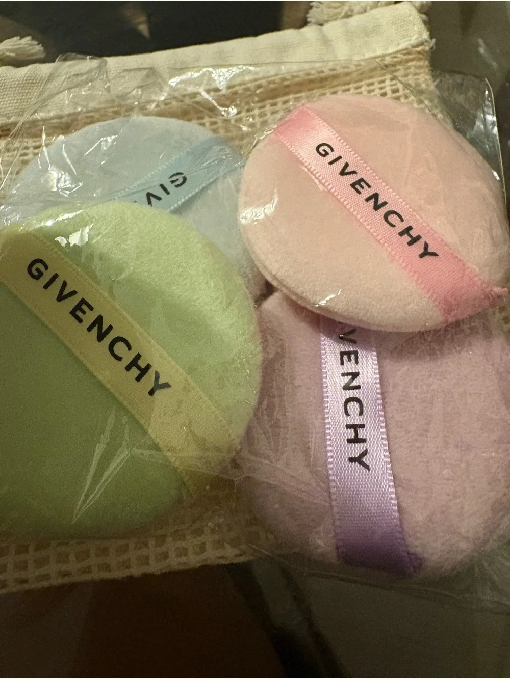 Givenchy Pastel Makeup Puffs in Pink, Lilac, Green, and baby blue with bag